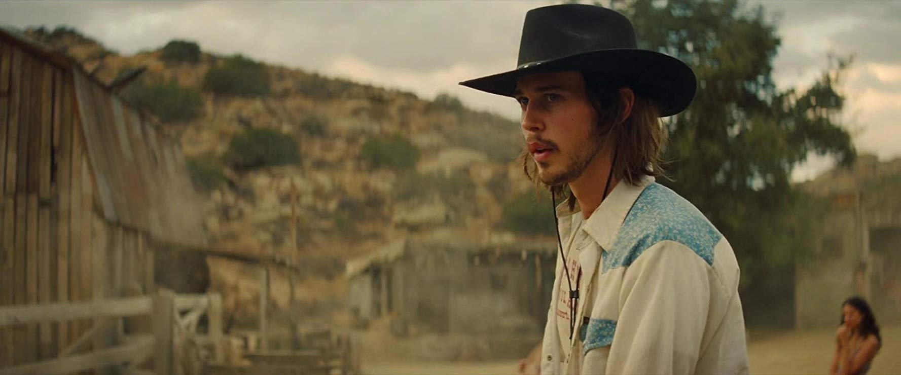 Austin Butler como Tex Watson